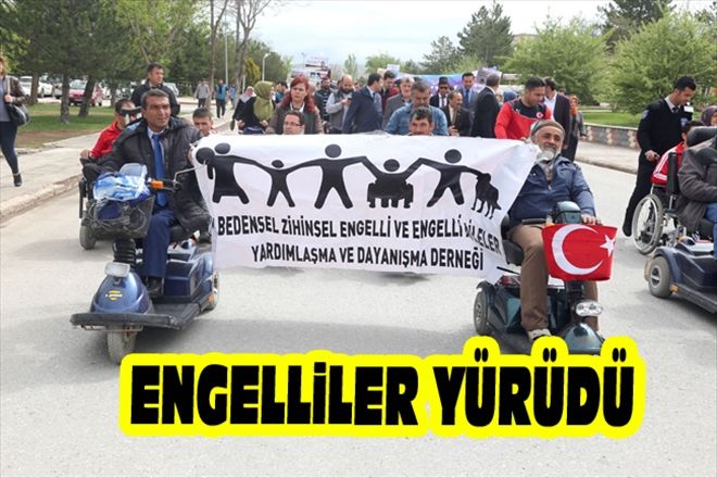 ENGELLiLER YÜRÜDÜ