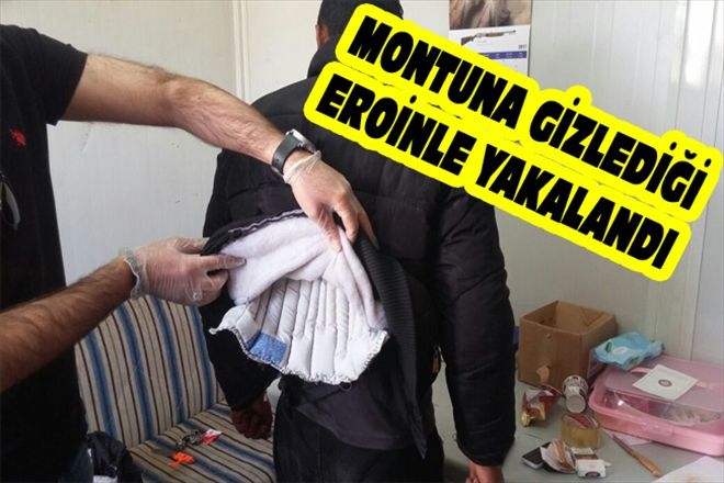 MONTUNA GİZLEDİĞİ EROİNLE YAKALANDI