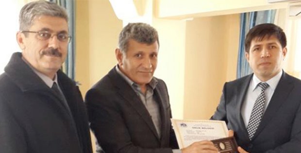 Koç´a Onur Belgesi